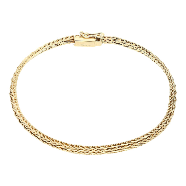 Pulsera eslabón boleado en oro amarillo 12 kilates.