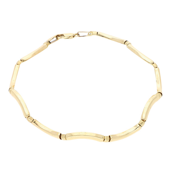 Pulsera eslabón articulado en oro amarillo 14 kilates.