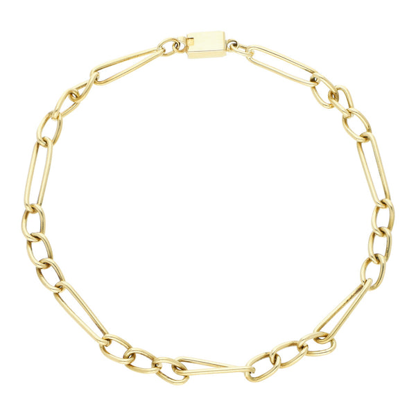 Pulsera de tres eslabones por uno en oro amarillo 18 kilates.