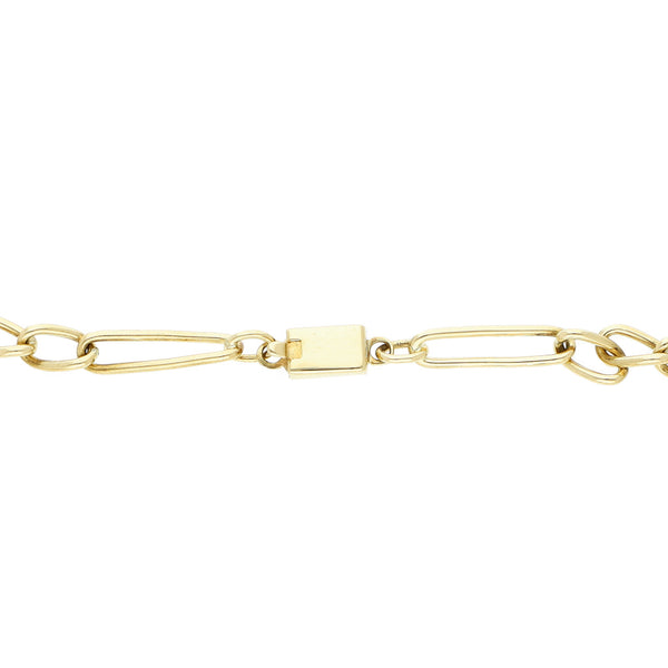 Pulsera de tres eslabones por uno en oro amarillo 18 kilates.