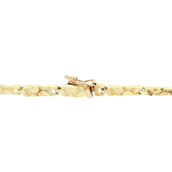 Pulsera eslabón articulado en oro amarillo 14 kilates.