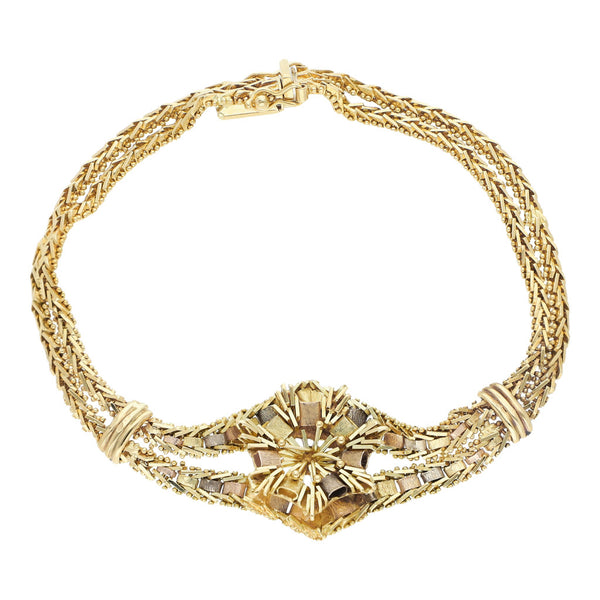 Pulsera de dos hilos eslabón boleado con aplicaciones en oro tres tonos 18 kilates.
