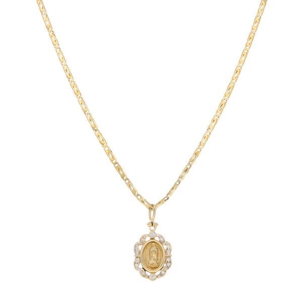 Collar nudo egipcio y medalla calada con circonias motivo Virgen de Guadalupe en oro amarillo.