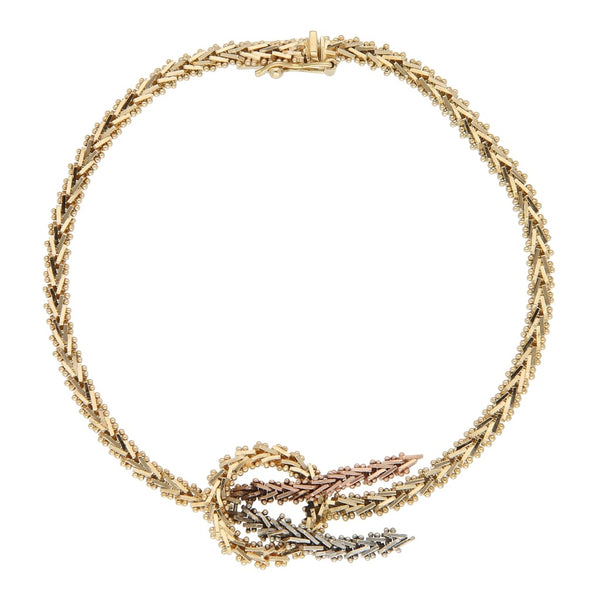 Pulsera eslabón boleado con colgantes en oro tres tonos 14 kilates.