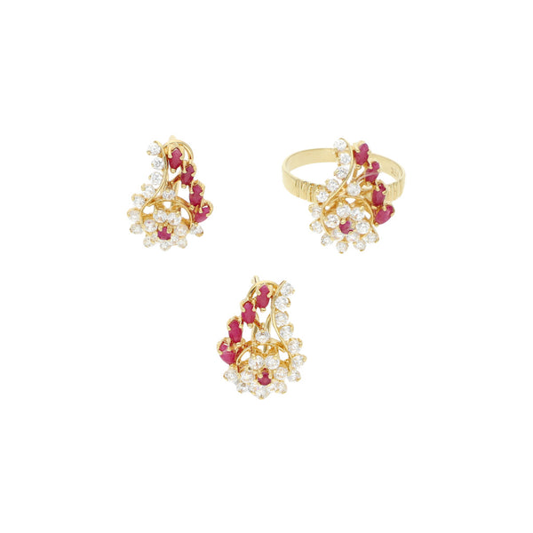 Juego de anillo y aretes diseño especial con rubíes y circonias en oro amarillo 14 kilates.