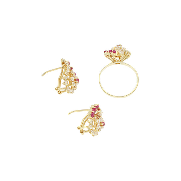 Juego de anillo y aretes diseño especial con rubíes y circonias en oro amarillo 14 kilates.