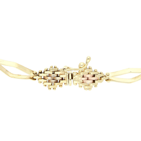 Pulsera eslabón combinado en oro tres tonos 14 kilates.