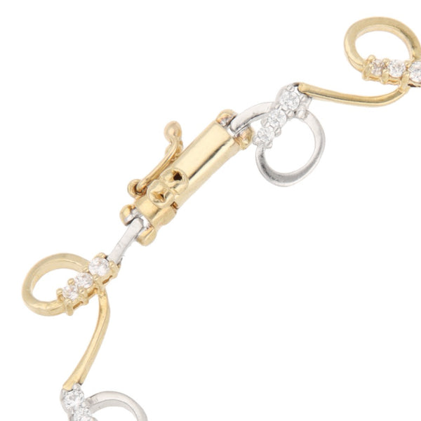 Pulsera eslabón articulado con sintéticos en oro dos tonos 14 kilates.