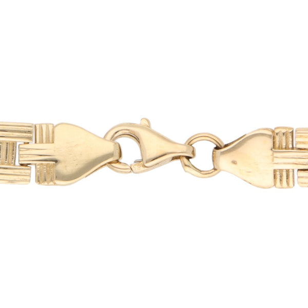 Pulsera eslabón articulado en oro amarillo 14 kilates.