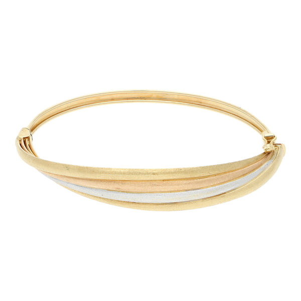 Pulsera de arillo articulada en oro tres tonos 14 kilates.