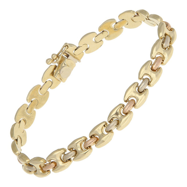 Pulsera eslabón articulado en oro tres tonos 14 kilates.
