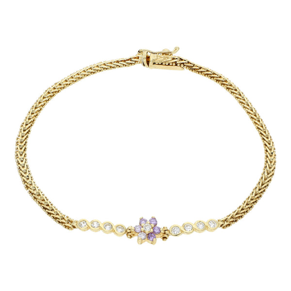 Pulsera eslabón boleado con aplicaciones y sintéticos en oro amarillo 14 kilates.