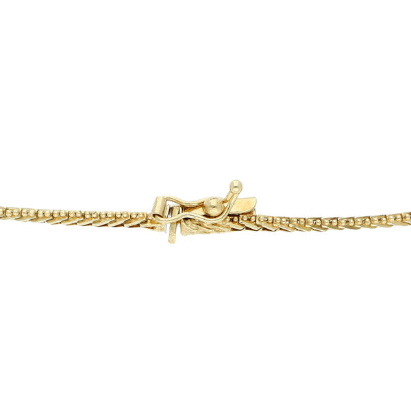 Pulsera eslabón boleado con aplicaciones y sintéticos en oro amarillo 14 kilates.