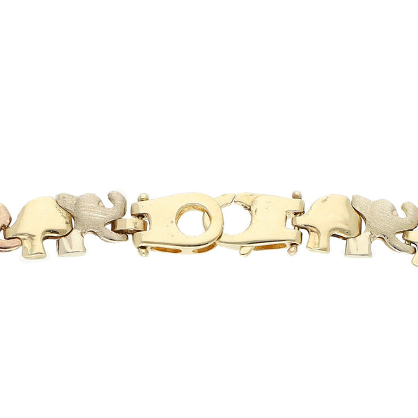 Pulsera eslabón laminado motivo elefantes con circonias en oro tres tonos 14 kilates.
