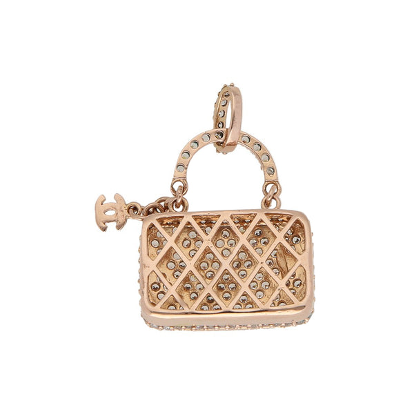 Dije hueco motivo bolso con sintéticos en oro rosa 14 kilates.