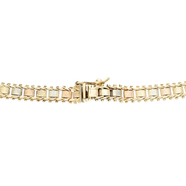 Pulsera eslabón boleado en oro tres tonos 14 kilates.