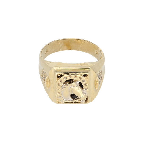Anillo tipo sello motivo caballo con sintéticos en oro amarillo 14 kilates.