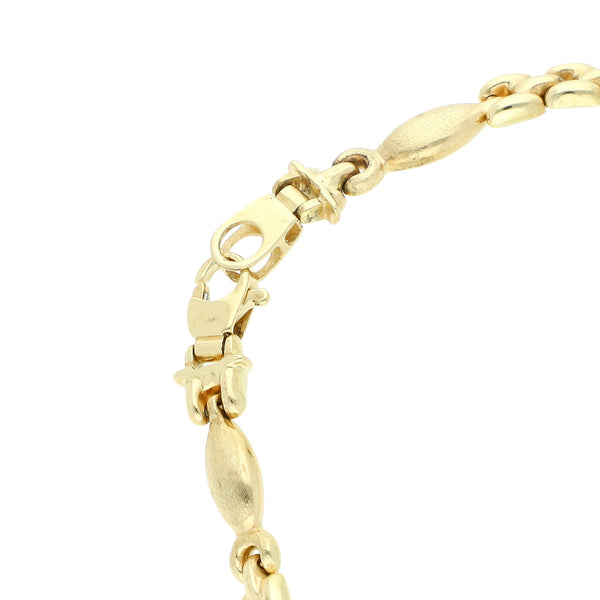 Pulsera eslabón articulado en oro amarillo 14 kilates.