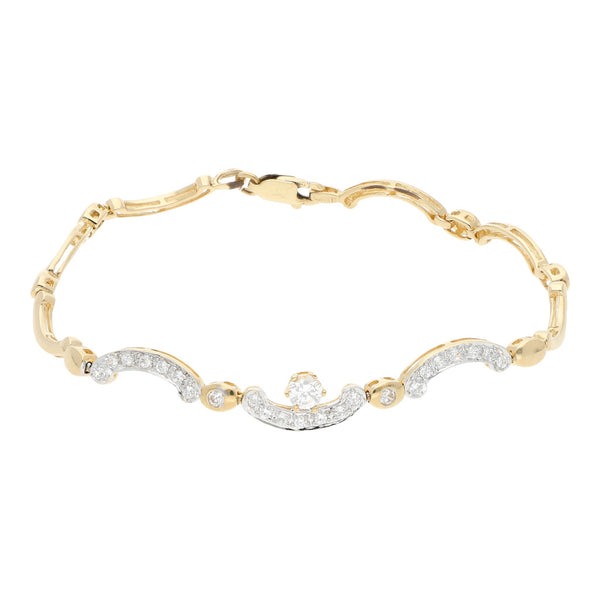 Pulsera eslabón articulado con aplicación y sintéticos en oro amarillo 14 kilates.