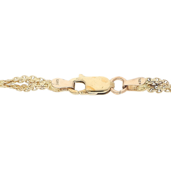 Pulsera eslabón articulado en oro dos tonos 14 kilates.