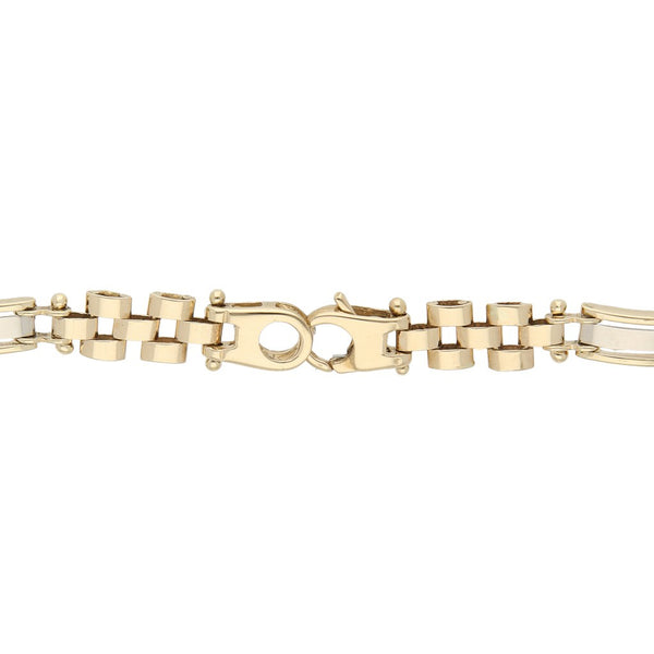 Pulsera eslabón articulado en oro dos tonos 14 kilates.