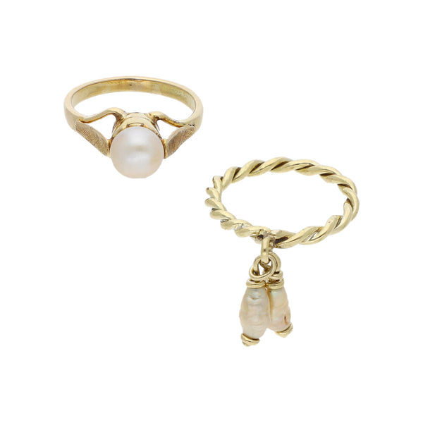 Dos anillos diseño especial con perlas en oro amarillo 14 kilates.