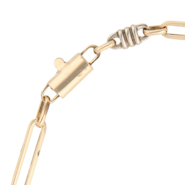 Pulsera eslabón combinado en oro dos tonos 14 kilates.