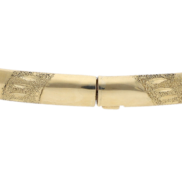Pulsera de arillo articulada motivo corazones en oro tres tonos 14 kilates.