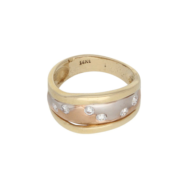 Anillo diseño especial con circonias en oro dos tonos 14 kilates.