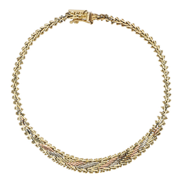 Pulsera eslabón boleado en oro tres tonos 14 kilates.