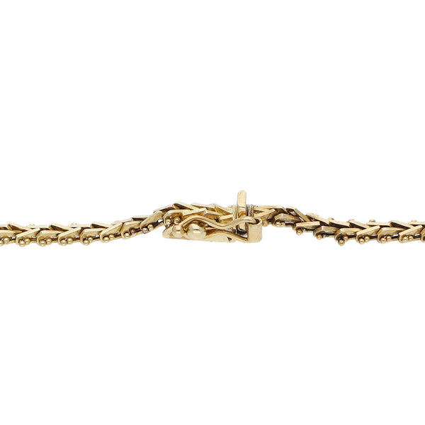 Pulsera eslabón boleado en oro tres tonos 14 kilates.