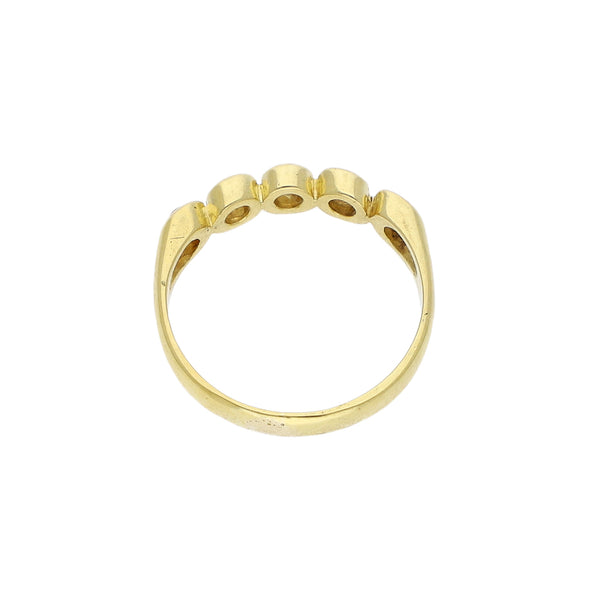 Anillo diseño especial con diamantes en oro amarillo 18 kilates.