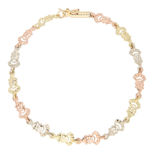 Pulsera eslabón articulado motivo payasos en oro tres tonos 14 kilates.