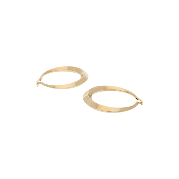 Arracadas huecas en oro amarillo 14 kilates.