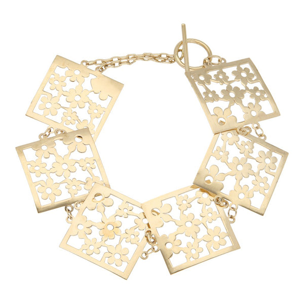 Pulsera de dos hilos eslabón cruzado con aplicaciones en oro amarillo 14 kilates.