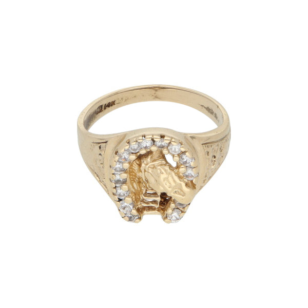 Anillo diseño especial con circonias motivo ecuestre en oro amarillo 14 kilates.