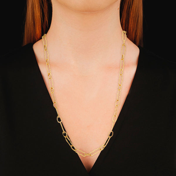 Collar eslabón combinado en oro amarillo 18 kilates.