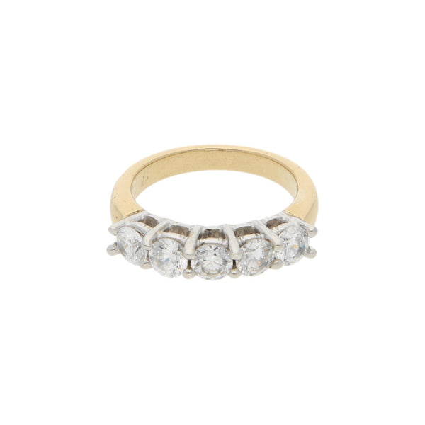 Anillo diseño especial con circonias en platino y oro amarillo 18 kilates.