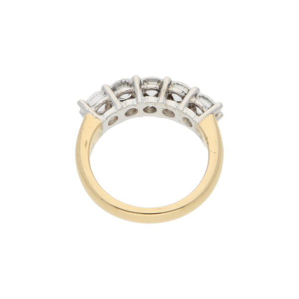 Anillo diseño especial con circonias en platino y oro amarillo 18 kilates.