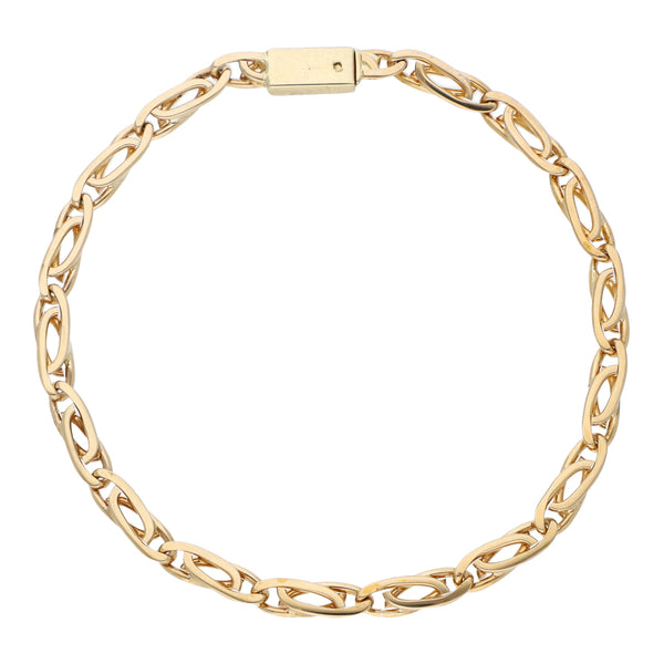 Pulsera eslabón nudo egipcio en oro amarillo 14 kilates.