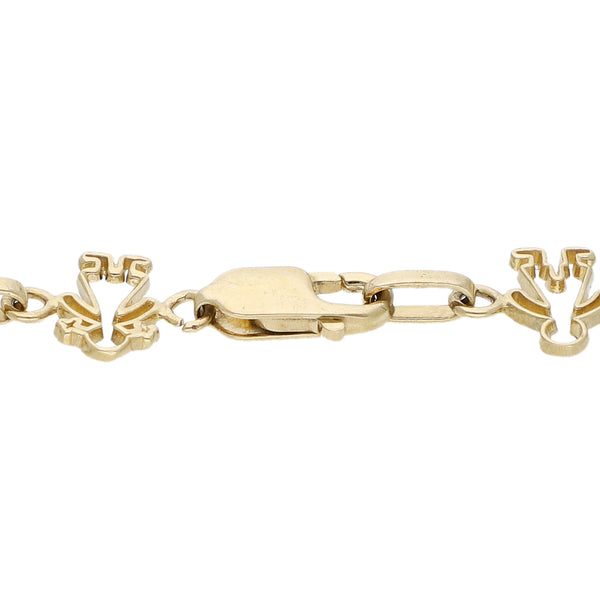 Pulsera eslabón combinado motivo niños en oro amarillo 14 kilates.