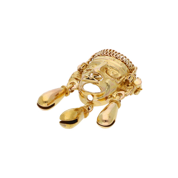 Prendedor diseño especial motivo mascara mixteca en oro amarillo 14 kilates.