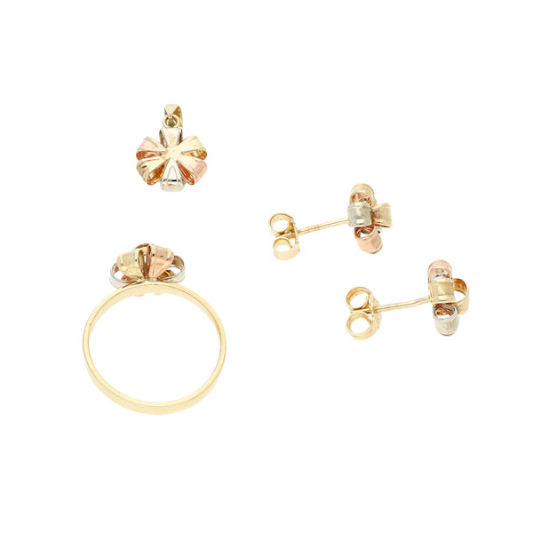 Juego de anillo, dije y broqueles diseño especial motivo moño en oro tres tonos 14 kilates.