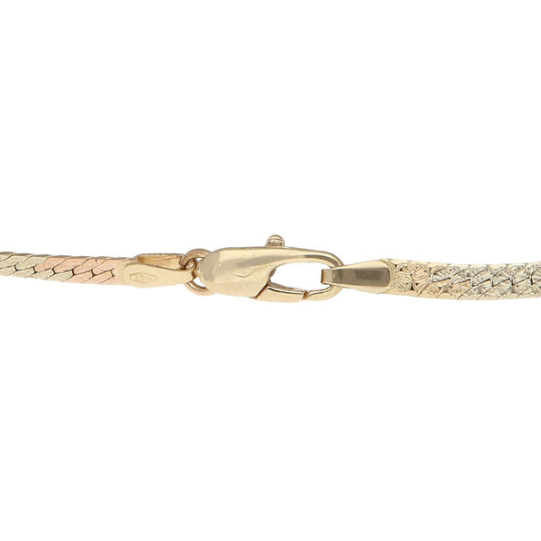 Pulsera eslabón planchado en oro tres tonos 14 kilates.
