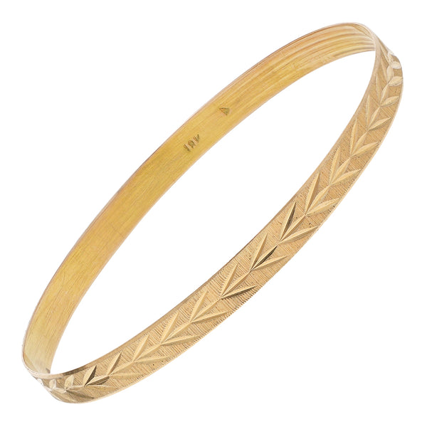 Pulsera de arillo facetada en oro amarillo 18 kilates.