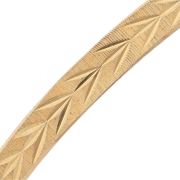 Pulsera de arillo facetada en oro amarillo 18 kilates.