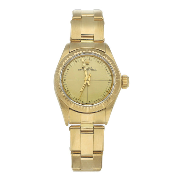 Reloj Rolex para dama modelo Oyster Perpetual en oro amarillo 18 kilates.