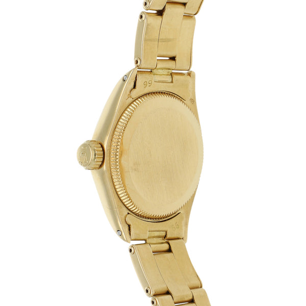 Reloj Rolex para dama modelo Oyster Perpetual en oro amarillo 18 kilates.