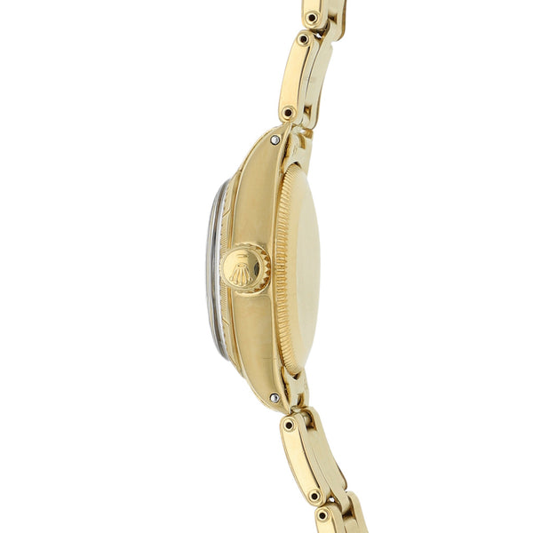 Reloj Rolex para dama modelo Oyster Perpetual en oro amarillo 18 kilates.