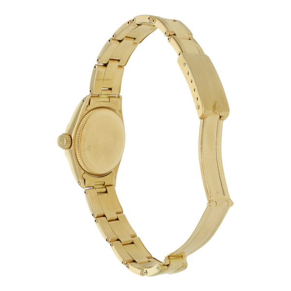 Reloj Rolex para dama modelo Oyster Perpetual en oro amarillo 18 kilates.